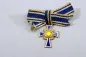 Preview: Miniature German Mother's Cross in Gold On ribbon bow; enamel undamaged.