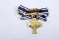 Preview: Miniature German Mother's Cross in Gold On ribbon bow; enamel undamaged.