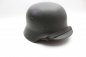 Preview: Wehrmacht M 40 EF 66/21478 steel helmet with wearer's name and a badge in top condition