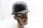 Preview: WW2 fire police steel helmet M35 / 40, without badge, fire helmet Q stamped with manufacturer  M35 / 40 steel helmet of the fire brigade, chin strap intact, inside stamped on leather size 56 and manufacturer Carl Henkel Bielefeld and company logo. Helmet