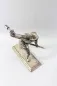 Preview: Plastische Darstellung eines mit Handgranate Voranstürmenden Infanteristen. Spritzguss versilbert, Gesamthöhe 23,5cm