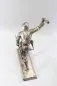 Preview: Plastische Darstellung eines mit Handgranate Voranstürmenden Infanteristen. Spritzguss versilbert, Gesamthöhe 23,5cm