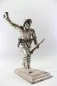 Preview: Plastische Darstellung eines mit Handgranate Voranstürmenden Infanteristen. Spritzguss versilbert, Gesamthöhe 23,5cm