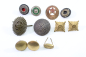 Preview: A set of 11 original uniform pieces, buttons, badges, overlays, and buckles
