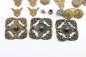 Preview: Discover a unique collection of 27 original uniform parts, buttons, badges, overlays, and buckles