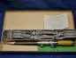 Preview: NVA officer's dagger of the land forces with hanger + parade sash + matching numbered box + guarantee certificate from 1984