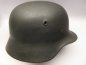 Preview: Stahlhelm M40 Luftwaffe Field Division with camouflage paint and a badge