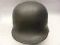 Preview: Stahlhelm M40 Luftwaffe Field Division with camouflage paint and a badge