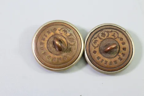 Metal uniform button from the stock of an old uniform tailor,