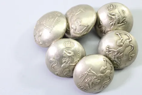 Original metal uniform button, also known as a livery button