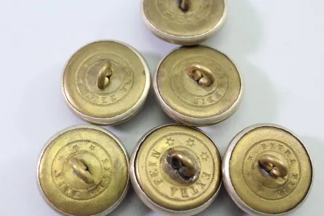 Original metal uniform button, also known as a livery button