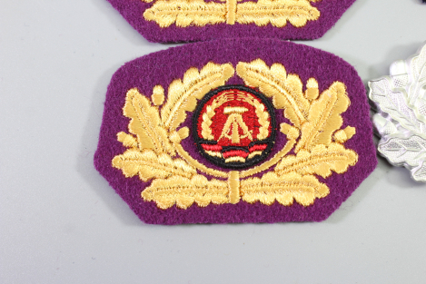 Collection of cap wreaths, including a general's cap wreath, 5 pieces in total.