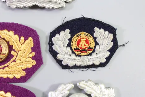 Collection of cap wreaths, including a general's cap wreath, 5 pieces in total.