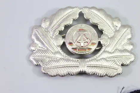 Collection of cap wreaths, including a general's cap wreath, 5 pieces in total.