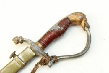 Letter opener in the shape of a miniature lion's head saber for officers with portepee