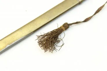 Letter opener in the shape of a miniature lion's head saber for officers with portepee