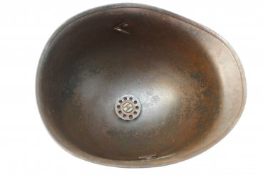 verry old BW steel helmet with remains of a white M on the front