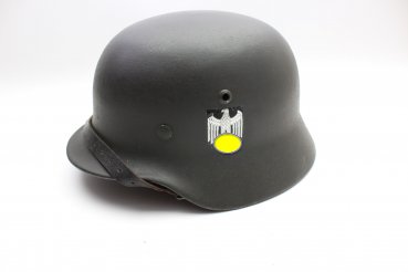 Wehrmacht M 40 EF 66/21478 steel helmet with wearer's name and a badge in top condition