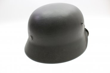 Wehrmacht M 40 EF 66/21478 steel helmet with wearer's name and a badge in top condition