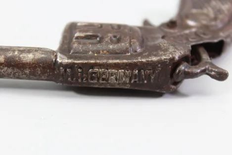 Metal toy pistol for children by Kastor, made in Germany, 1920s–1930s.