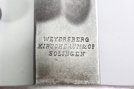 Short edged weapon – Argentine Model 1891 bayonet (WKC) with matching scabbard.