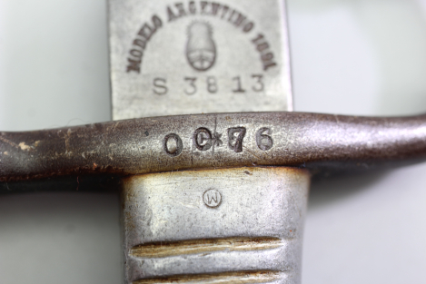Short edged weapon – Argentine Model 1891 bayonet (WKC) with matching scabbard.