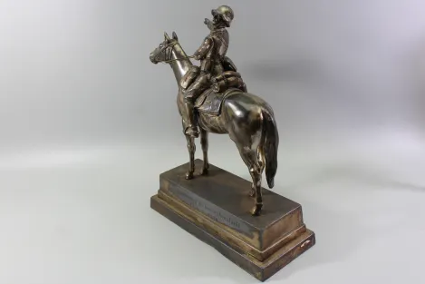 Original sculpture of a mounted German Wehrmacht cavalry soldier with steel helmet and equipment; inscribed "In memory of my service 1924–1938"