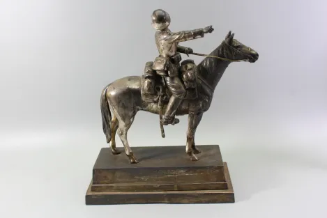 Original sculpture of a mounted German Wehrmacht cavalry soldier with steel helmet and equipment; inscribed "In memory of my service 1924–1938"