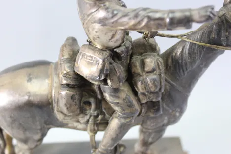 Original sculpture of a mounted German Wehrmacht cavalry soldier with steel helmet and equipment; inscribed "In memory of my service 1924–1938"