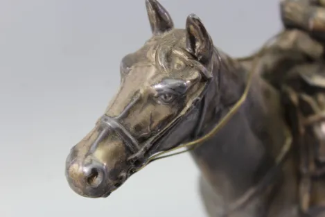 Original sculpture of a mounted German Wehrmacht cavalry soldier with steel helmet and equipment; inscribed "In memory of my service 1924–1938"