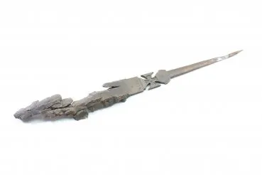 Patriotic letter opener made of shrapnel, blade tip damage