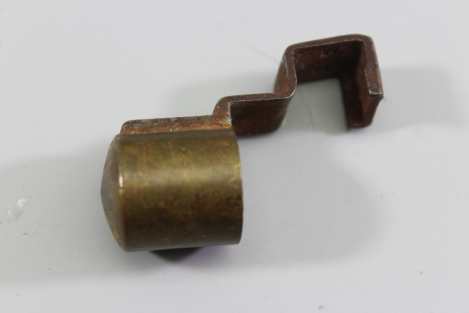 Historical muzzle protector (mouthguard) for the K98 military rifle with unit marking