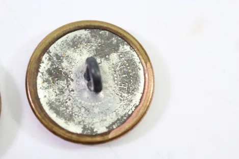 Metal buttons from German uniform tailor