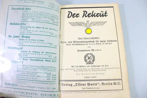 "The Recruit" A training manual for young soldiers, dated 1935/36, 191 pages.  Dust jacket