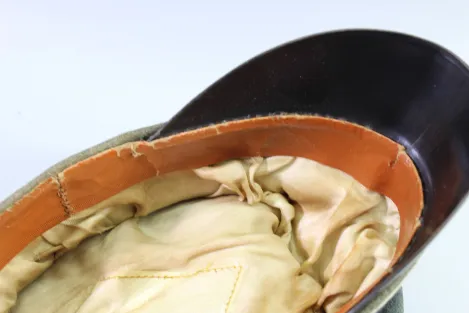 Early peaked cap for infantry officers, so-called "crumpled cap," circa 1940.