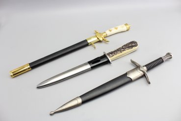 3 decorative daggers, collector's item deer catcher, air force dagger and trench knife