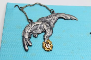 Tray with 7 Polish Air Force awards on cardboard