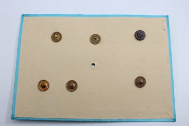 Tray with 7 Polish Air Force awards on cardboard