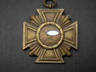 NSDAP service award in bronze, zinc bronzed on ribbon in the brown award box