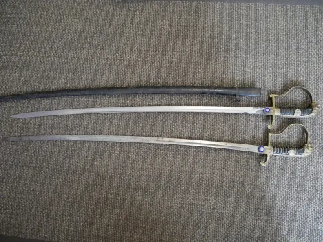 Two lion-head officer's sabers, WWII.