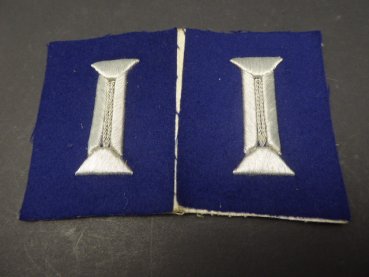 A pair of sleeves - flaps, gun color blue from a tailor's estate, unsewn