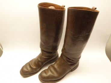 A pair of brown police or SA boots