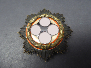 DK German cross in gold with manufacturer 134, engraved with wearer's name and date on the back