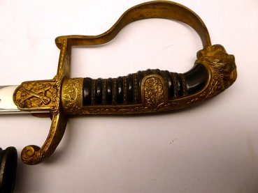 Very early Eickhorn infantry lion's head saber with owner's monogram