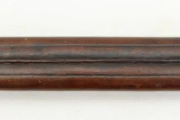 Officer's saber with blade etching in leather sheath.