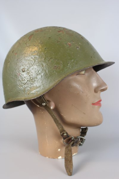 Russian WW2 steel helmet M40, 1940 Without the 3 fabric inner sails, with original paint. Nice towed helmet with the original paint.