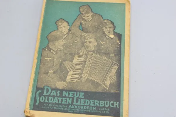 Wehrmacht song book and pocket calendar war planes.