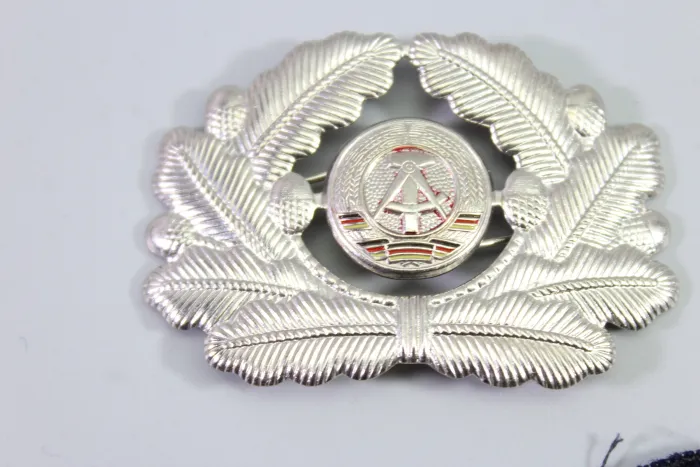 Collection of cap wreaths, including a general's cap wreath, 5 pieces in total.