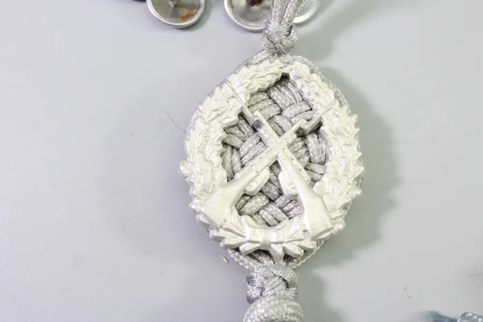 East German National People's Army (NVA) Rifleman's Lanyard and NVA Uniform Buttons