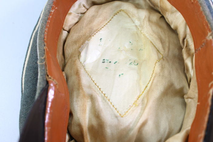 Early peaked cap for infantry officers, so-called "crumpled cap," circa 1940.